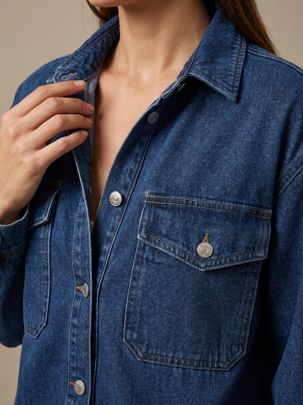 Close view of the chest pocket and its press stud