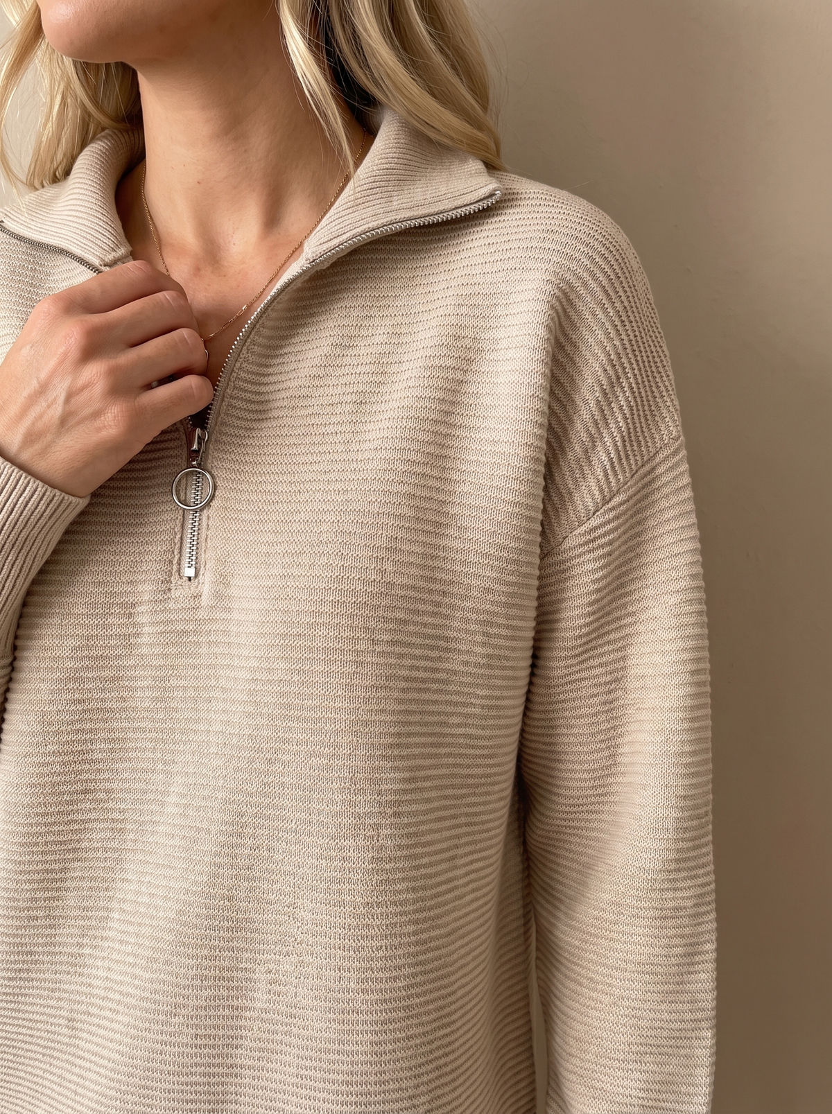 Close view of the half-zip collar