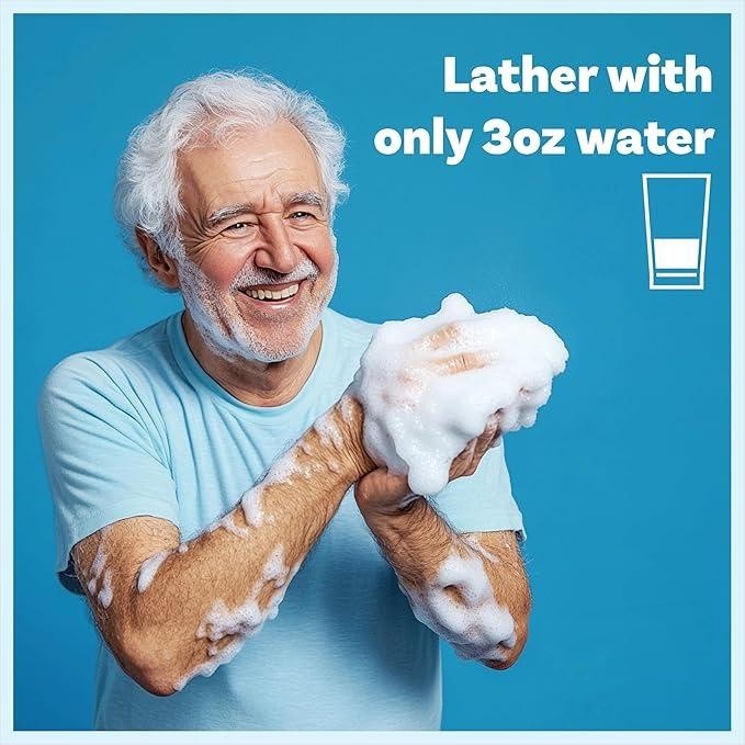 Senior man lathering his arms: lathers with only 3 oz of water