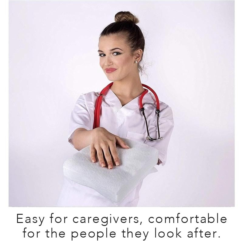 Caregiver holding a stack of bath sponges: easy for caregivers, comfortable for the people they look after