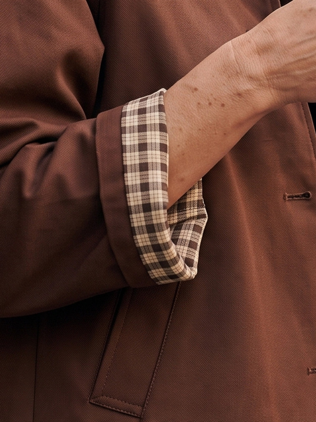 The turned-back cuff and its check lining