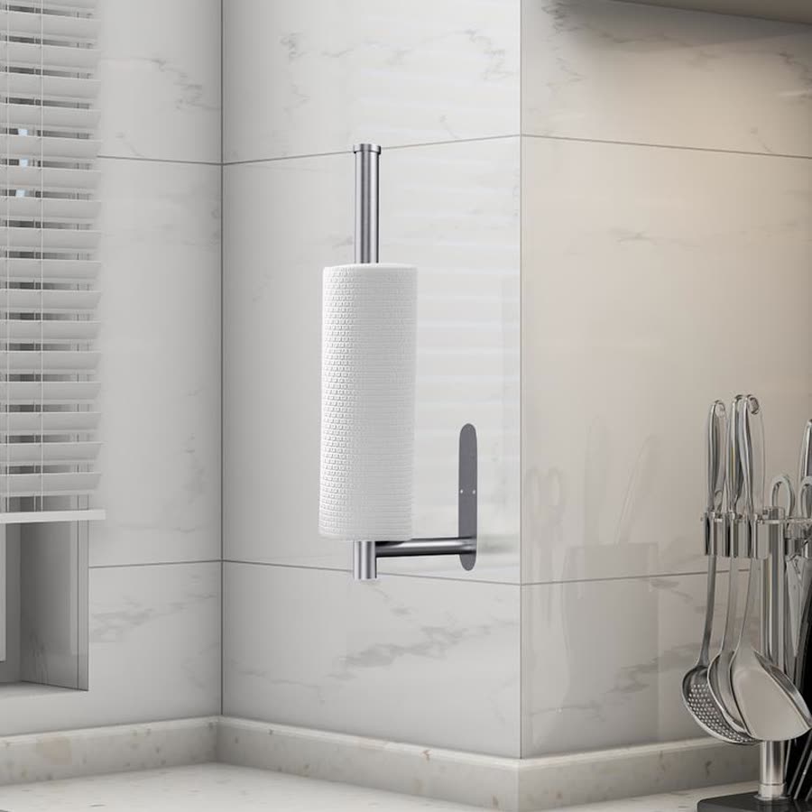 Brushed steel holder mounted vertically on a kitchen wall