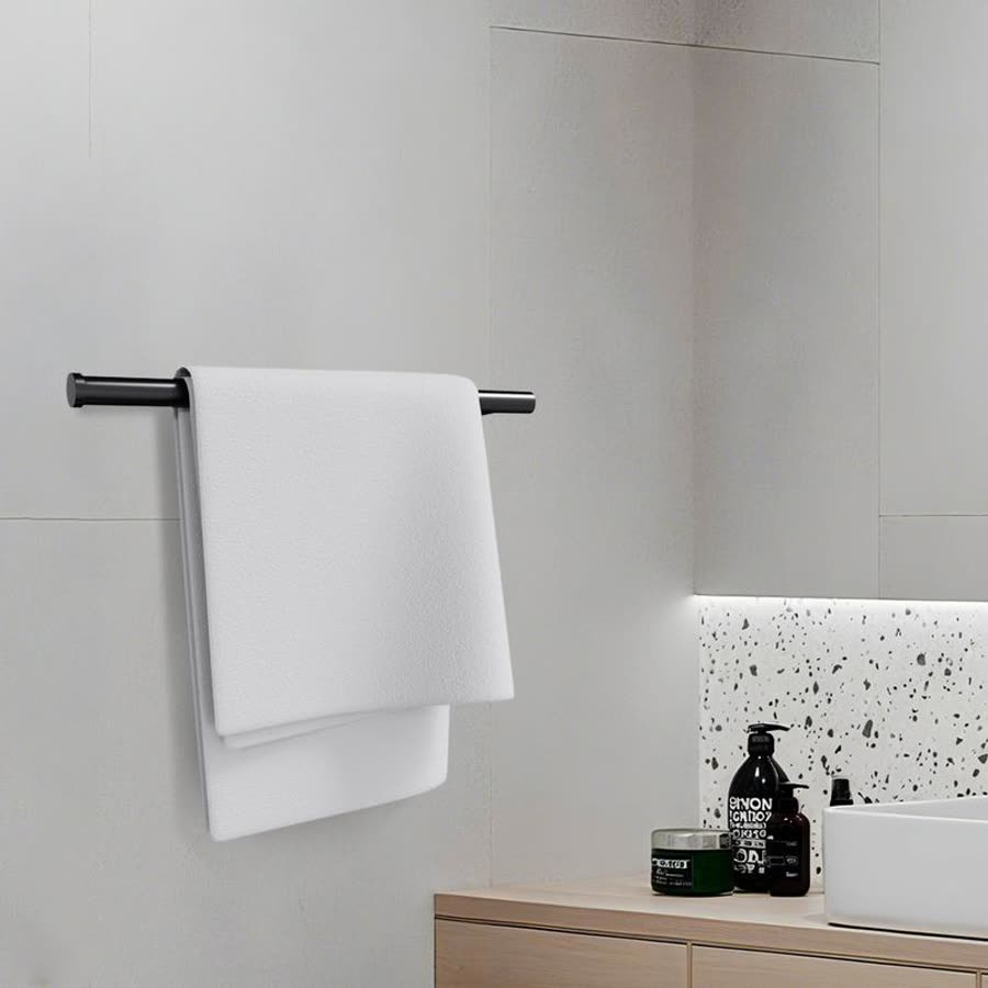 Matte black holder used as a bathroom towel rail